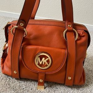 Michael Kors handbag, 13W x 11H x 4.5D, gold tone hardware, rust color
